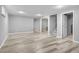 Finished basement boasts open layout and access to stairs, providing ample space for recreation and relaxation at 2572 Beech Ct, Golden, CO 80401
