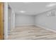 Spacious basement area with durable flooring and neutral walls offers versatility for various uses at 2572 Beech Ct, Golden, CO 80401