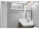 Bright bathroom with a modern vanity and sleek fixtures, plus shower and window at 2572 Beech Ct, Golden, CO 80401