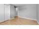 Empty bedroom features hardwood floors, large closets, and multiple doorways at 2572 Beech Ct, Golden, CO 80401