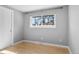 Bedroom featuring a window, hardwood floors, and white trim at 2572 Beech Ct, Golden, CO 80401
