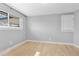 Bright bedroom features hardwood floors, a large window, and neutral paint, creating a serene atmosphere at 2572 Beech Ct, Golden, CO 80401