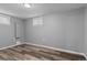 This bedroom features sleek flooring and a window offering natural light at 2572 Beech Ct, Golden, CO 80401