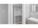 Walk-in closet with built-in shelves and a view into the en suite bathroom at 2572 Beech Ct, Golden, CO 80401