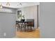 Contemporary dining room with hardwood floors, a modern fireplace, and stylish seating arrangements at 2572 Beech Ct, Golden, CO 80401