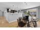 Open dining area with modern decor and sliding glass doors that provides access to the backyard at 2572 Beech Ct, Golden, CO 80401