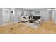 Bright living room featuring hardwood floors, stylish furniture, and an open layout at 2572 Beech Ct, Golden, CO 80401