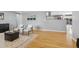 Bright living room featuring hardwood floors, stylish furniture, and an open layout at 2572 Beech Ct, Golden, CO 80401