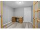 Bright home office featuring modern desk and new door at 2572 Beech Ct, Golden, CO 80401