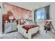 Well-lit bedroom with decorative wall and patterned window coverings, neutral carpet, stylish decorations and wall art at 14099 Bunny Hop Ln, Parker, CO 80134