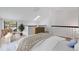 Cozy bedroom featuring a skylight, warm decor, and large window with lots of natural light at 225 E 8Th Ave # A2, Longmont, CO 80504