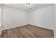 Spacious bedroom featuring vinyl floors, neutral paint, and ample natural light at 225 E 8Th Ave # A2, Longmont, CO 80504