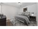 Comfortable bedroom featuring new floors, neutral paint, and lots of natural light at 225 E 8Th Ave # A2, Longmont, CO 80504