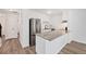 Well-lit kitchen with stainless steel appliances, granite countertops, and ample cabinet space at 225 E 8Th Ave # A2, Longmont, CO 80504