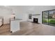 Bright and airy living area with eat-in kitchen, fireplace, and outdoor access at 225 E 8Th Ave # A2, Longmont, CO 80504