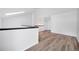 Bright living space with wood-look floors, fresh paint, and skylight at 225 E 8Th Ave # A2, Longmont, CO 80504