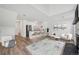 Bright open concept living area featuring wood floors, modern decor, and eat-in kitchen area at 225 E 8Th Ave # A2, Longmont, CO 80504