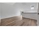 Spacious loft area with natural light, vaulted ceilings, and new vinyl floors at 225 E 8Th Ave # A2, Longmont, CO 80504