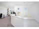 Second floor hallway with a view of the living area and exterior windows at 16722 Chilton Dr, Mead, CO 80542