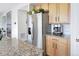 Kitchen featuring stainless steel refrigerator, and granite countertops at 16722 Chilton Dr, Mead, CO 80542