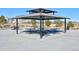 A covered pavilion offers multiple picnic tables in a well-kept community space at 16722 Chilton Dr, Mead, CO 80542