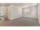 Spacious bedroom with neutral carpet and a bright window at 455 S Salida St, Aurora, CO 80017
