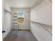 Spacious walk-in closet with shelving and a window offering natural light at 455 S Salida St, Aurora, CO 80017