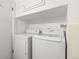 Laundry closet with washer and dryer, conveniently located at 12820 Willow Ln # 18, Golden, CO 80401