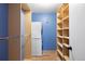 Organized walk-in closet with built-in shelving and closet rod, offering efficient storage solutions at 480 S Marion Pkwy # 306, Denver, CO 80209