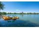 View of the waterfront with boats docked on the lake; the perfect place to enjoy recreational activities at 480 S Marion Pkwy # 306, Denver, CO 80209