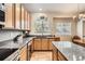 Well-appointed kitchen with granite countertops and modern stainless steel appliances at 19131 E Crestridge Cir, Aurora, CO 80015