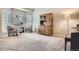 Bright living room featuring vaulted ceilings, neutral colors, and plush carpeting at 19131 E Crestridge Cir, Aurora, CO 80015