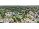 An aerial view of a tree-lined neighborhood with well-maintained homes and buildings at 2935 S Sherman St, Englewood, CO 80113