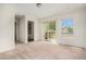 Comfortable bedroom with balcony access and neutral carpeting at 2935 S Sherman St, Englewood, CO 80113