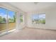 Bedroom with balcony access, offering a blend of indoor comfort and outdoor views at 2935 S Sherman St, Englewood, CO 80113
