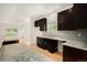 Well-lit kitchen with an island and seamless flow into the adjacent living area at 2935 S Sherman St, Englewood, CO 80113