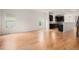 Spacious living room featuring hardwood floors and an open concept layout with easy access to the kitchen at 2935 S Sherman St, Englewood, CO 80113