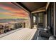 Enjoy the views from this spacious balcony, with seating, and lots of sunlight at 15230 W Baker Ave, Lakewood, CO 80228