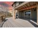 Relax on the spacious deck with a built-in BBQ, ideal for outdoor living and entertainment at 15230 W Baker Ave, Lakewood, CO 80228