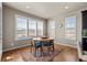 Cozy dining area featuring natural light and lovely views of the outside landscape at 15230 W Baker Ave, Lakewood, CO 80228