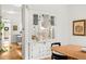 Dining room features built-in cabinets, hardwood floors, and stylish decor at 562 N Pennsylvania St, Denver, CO 80203