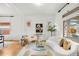 Inviting living room filled with light, showcasing hardwood floors and stylish decor at 562 N Pennsylvania St, Denver, CO 80203