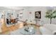 Bright living room boasts hardwood floors, modern decor, and ample natural light at 562 N Pennsylvania St, Denver, CO 80203