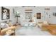 Bright living room featuring modern furniture, a glass table, and stylish decor at 562 N Pennsylvania St, Denver, CO 80203