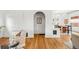 Bright and airy living room showcasing hardwood floors and seamless transition into the dining area at 562 N Pennsylvania St, Denver, CO 80203