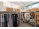 Spacious walk-in closet with organized shelving, clothing racks, and ample storage solutions at 562 N Pennsylvania St, Denver, CO 80203