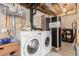Laundry area has a new LG washer and dryer and unique decor at 5722 S Addison Way # A, Aurora, CO 80016