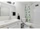 Clean bathroom with a bathtub and shower at 300 S Clinton St # 8C, Denver, CO 80247