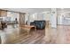 Bright living room features hardwood floors and an open floor plan at 300 S Clinton St # 8C, Denver, CO 80247