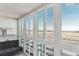 Bright sunroom with expansive views and comfortable seating at 300 S Clinton St # 8C, Denver, CO 80247